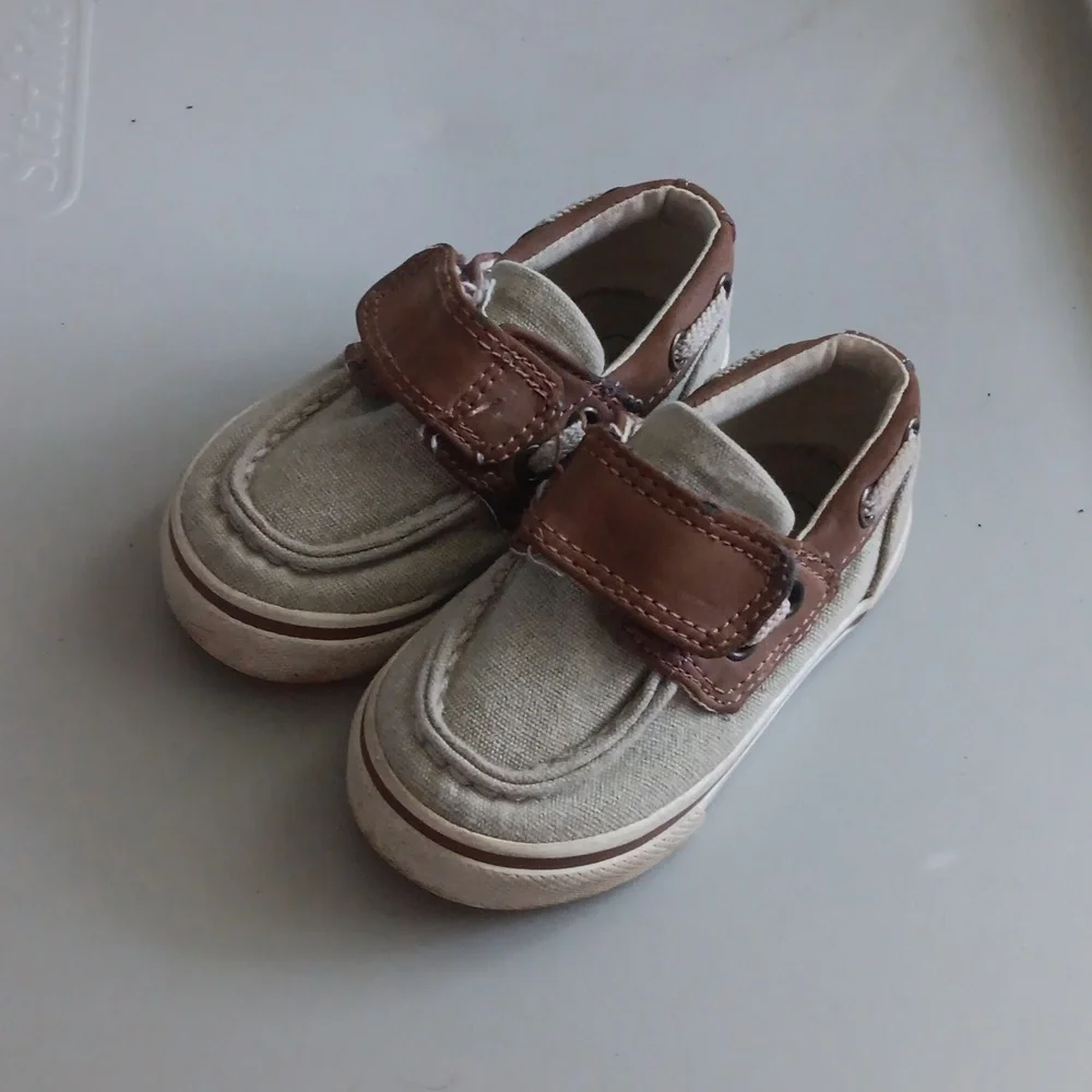 Tan and brown canvas boat shoes